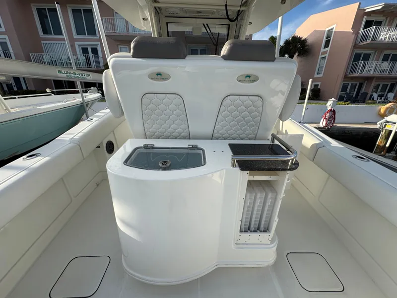 Slide: The Image of 2018 World Cat 280 CC-X boat interior with seating and storage. - 14