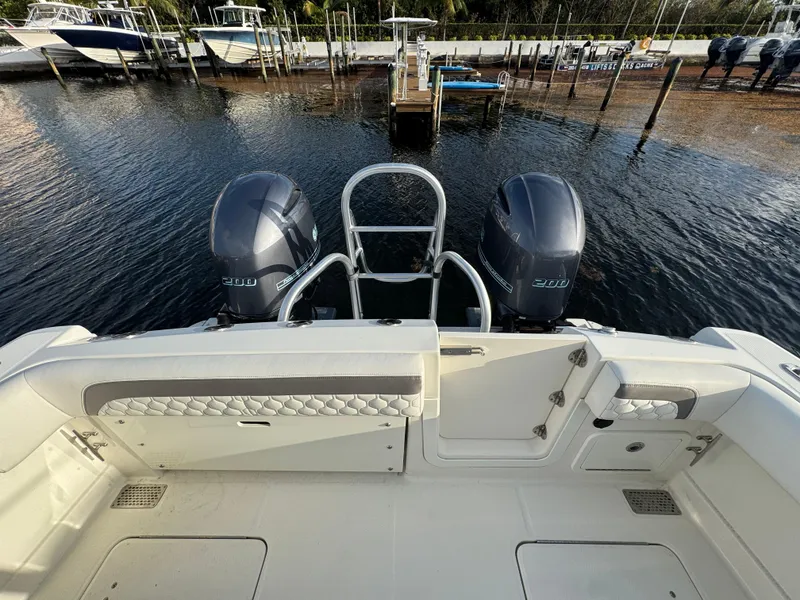 Slide: The Image of 2018 World Cat 280 CC-X boat with dual engines docked at marina. - 15