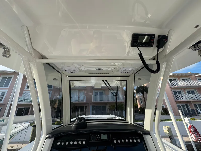 Slide: The Image of Interior view of 2018 World Cat 280 CC-X boat cockpit with control panel. - 8