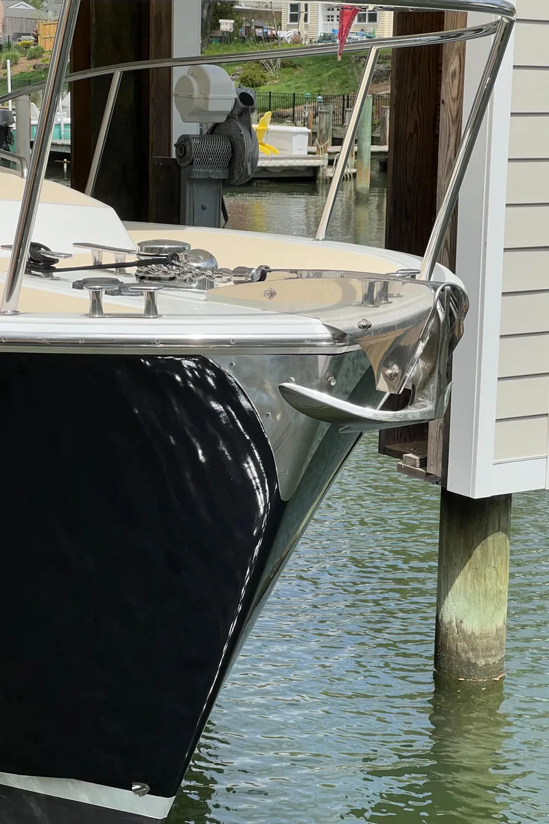 Slide: The Image of 2011 MJM 36Z boat docked near a wooden pier. - 31