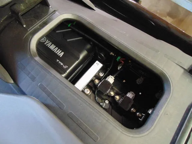 Slide: The Image of 2023 Yamaha Waverunner Jetblaster engine compartment, showcasing internal components and Yamaha branding. - 11