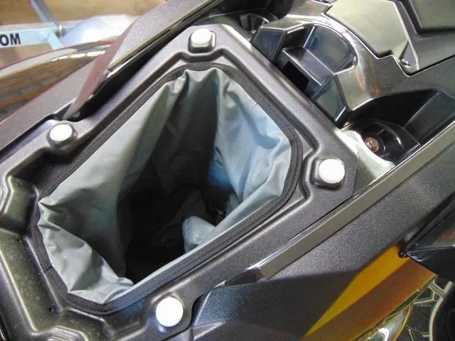 Slide: The Image of 2023 Yamaha Waverunner Jetblaster storage compartment, open and empty. - 14