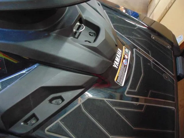 Slide: The Image of 2023 Yamaha Waverunners Jetblaster, close-up of sleek black design and branding. - 9