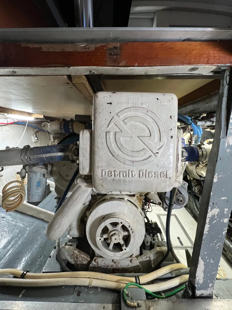 Slide: The Image of 1985 Bertram 46 Convertible engine compartment with Detroit Diesel engine. - 44