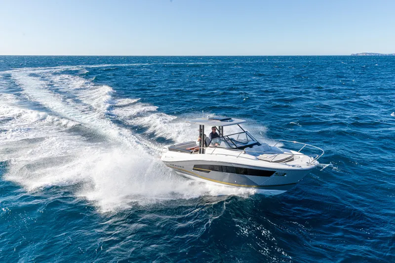 Slide: The Image of 2025 Jeanneau Leader 9.0 WA S2 cruising on open blue sea. - 3