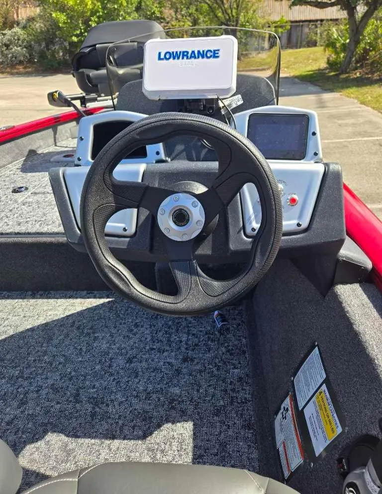 Slide: The Image of 2025 Tracker Pro Team 175 Crappie Edition boat dashboard with Lowrance electronics. - 3