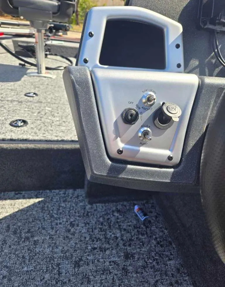 Slide: The Image of Control panel of 2025 Tracker Pro Team 175 Crappie Edition boat interior. - 5