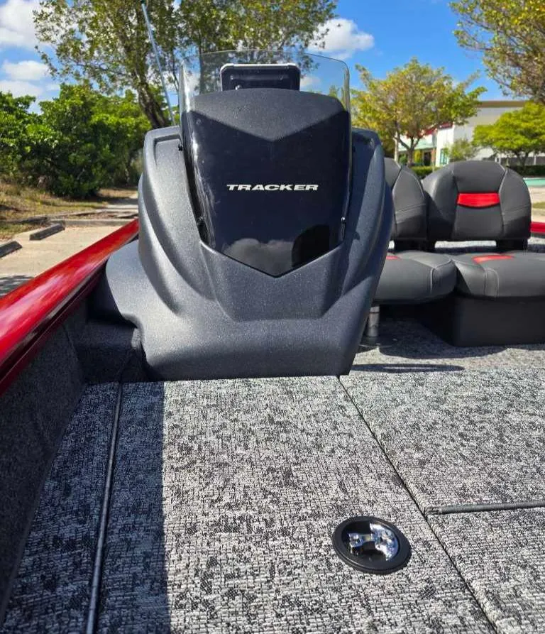 Slide: The Image of 2025 Tracker Pro Team 175 Crappie Edition boat with sleek design and comfortable seating. - 6