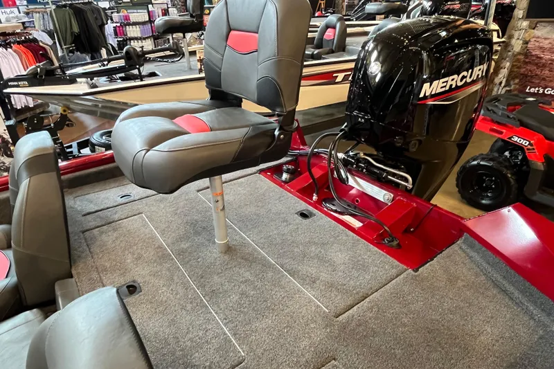 Slide: The Image of 2025 Tracker Pro Team 175 boat interior with Mercury engine and seating. - 3