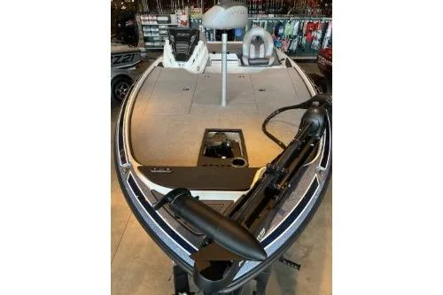 Slide: The Image of 2024 Nitro Z20 boat with sleek design and advanced features, displayed in showroom. - 4