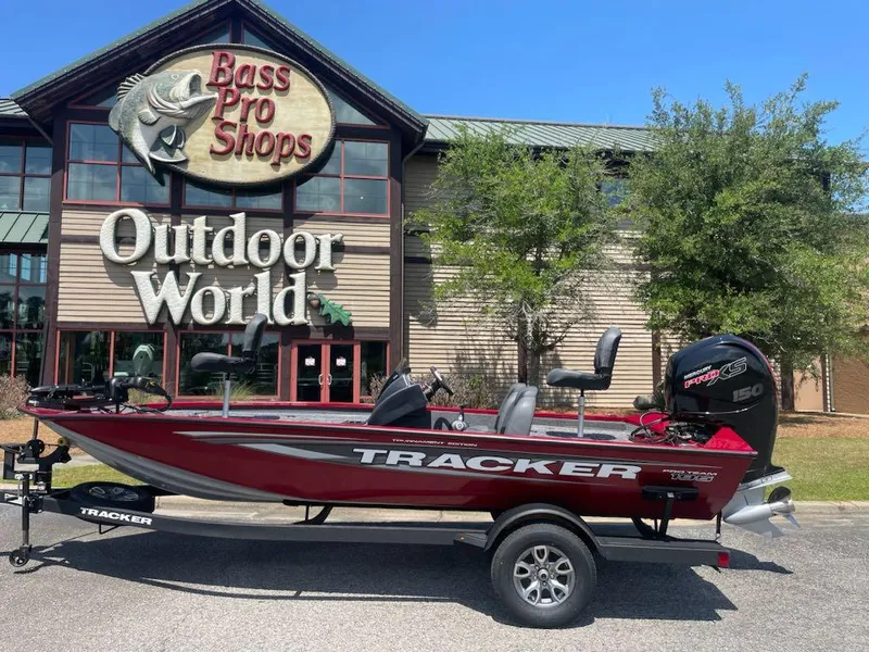 Slide: The Image of 2025 Tracker Pro Team 195 Tournament Edition boat outside Bass Pro Shops Outdoor World. - 5