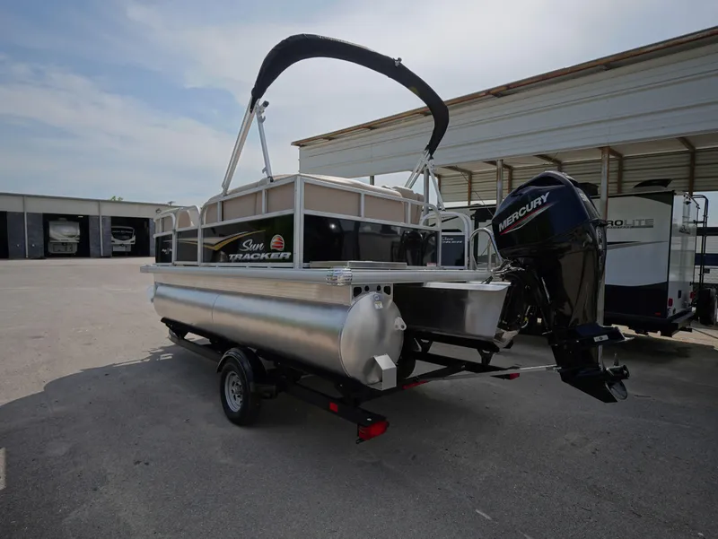 Slide: The Image of 2025 Sun Tracker Party Barge 16 DLX pontoon boat with Mercury outboard motor. - 3