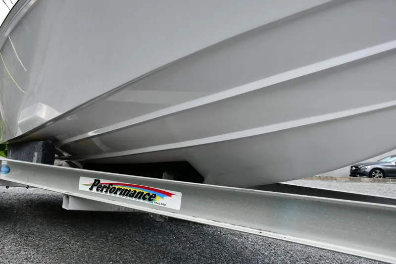 Slide: The Image of 2007 Donzi Carol Shelby 22 Classic boat on Performance trailer, close-up view. - 14