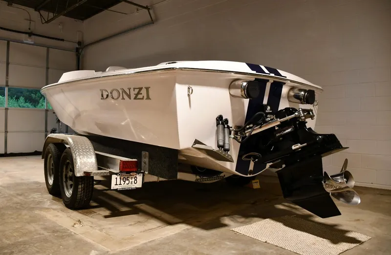 Slide: The Image of 2007 Donzi Carol Shelby 22 Classic boat on trailer in garage. - 16