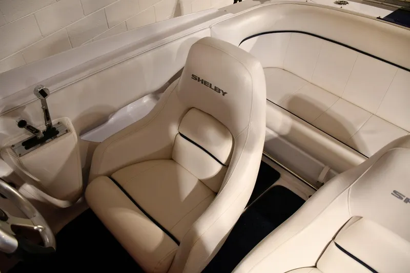 Slide: The Image of 2007 Donzi Carol Shelby 22 Classic boat interior with white leather seats. - 20