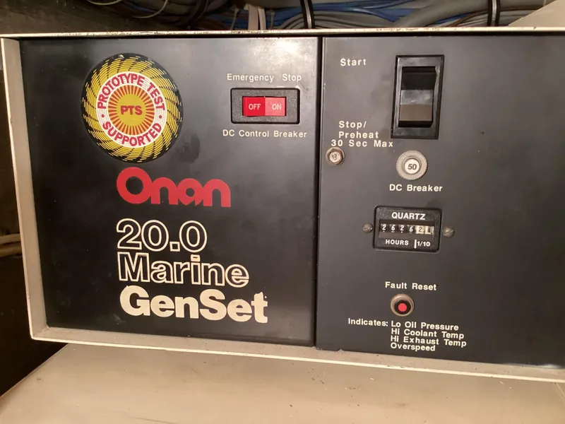 Slide: The Image of Onan 20.0 Marine GenSet control panel on 1995 Hatteras 52 Motor Yacht. - 103