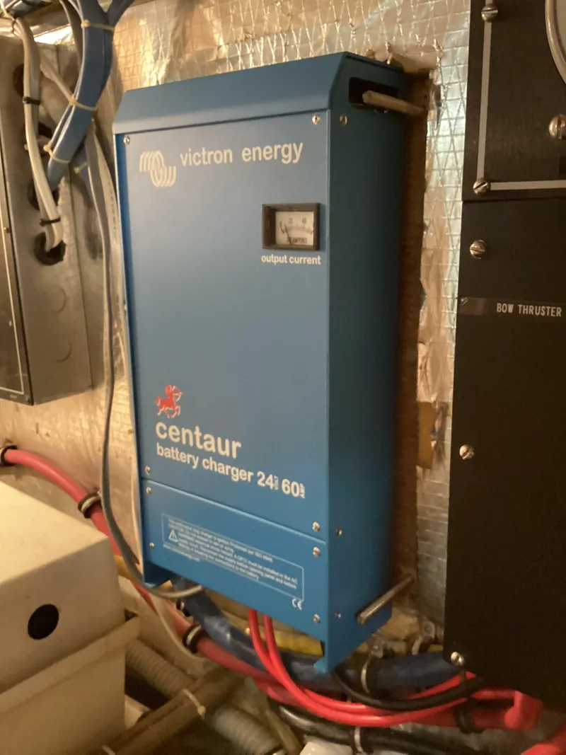Slide: The Image of Victron Energy Centaur battery charger in 1995 Hatteras 52 Motor Yacht engine room. - 104