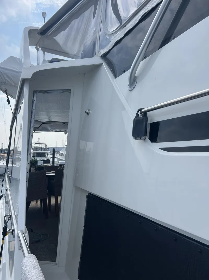 Slide: The Image of HARD WING DOORS TO AFT DECK & FOREDECK BOW AREA - 107