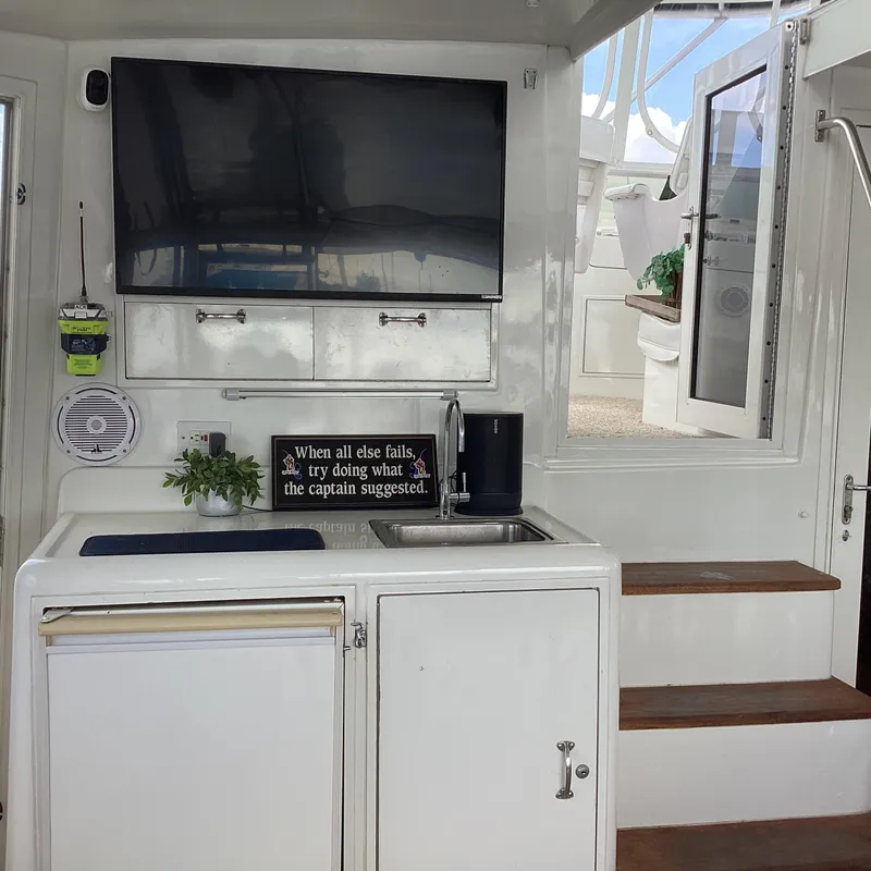 Slide: The Image of AFT DECK WETBAR W/FRIDGE & FLAT SCREEN SMART TV - 65