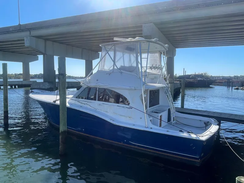 Slide: The Image of DOCKSIDE PROFILE AFTER NEW FRAMELESS TEMPERED LAMINATE WINDOWS INSTALLED IN 2023 - 24