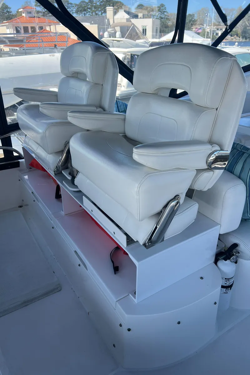 Slide: The Image of White leather seats on a 2008 Sunseeker Manhattan 50 yacht. - 14