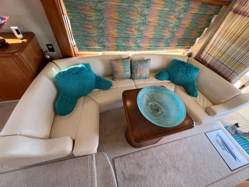 Slide: The Image of Luxurious Sunseeker Manhattan 50 yacht interior with plush seating and vibrant decor, 2008 model. - 19