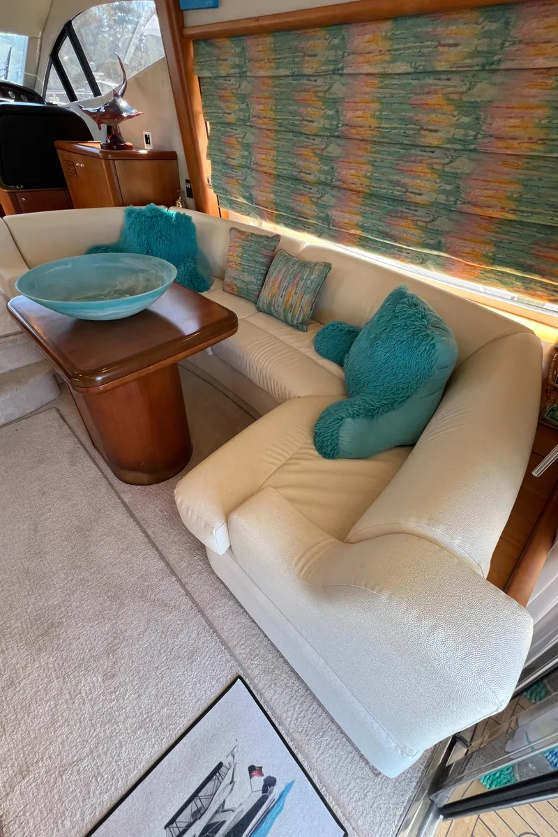 Slide: The Image of Interior of 2008 Sunseeker Manhattan 50 yacht with cozy seating and colorful decor. - 20