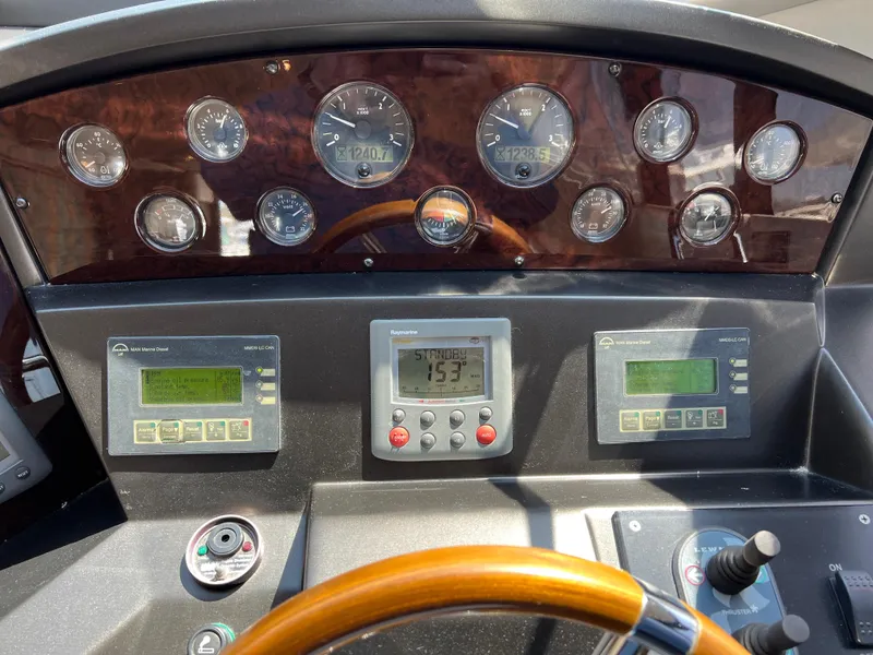 Slide: The Image of Dashboard of 2008 Sunseeker Manhattan 50 yacht with gauges and controls. - 30
