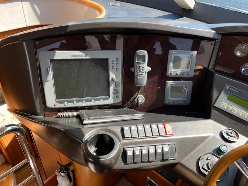 Slide: The Image of Control panel of a 2008 Sunseeker Manhattan 50 yacht with navigation equipment. - 31