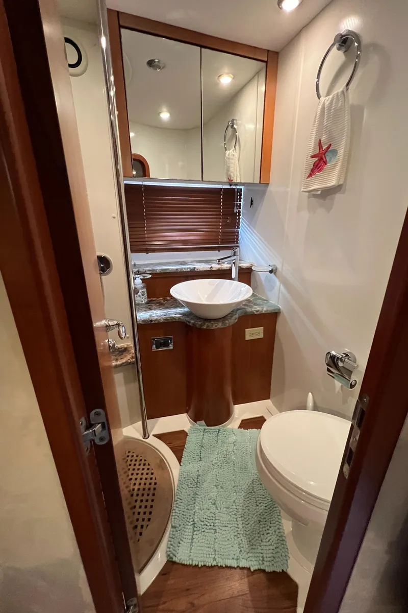 Slide: The Image of Luxurious bathroom in 2008 Sunseeker Manhattan 50 yacht with modern fixtures and decor. - 49