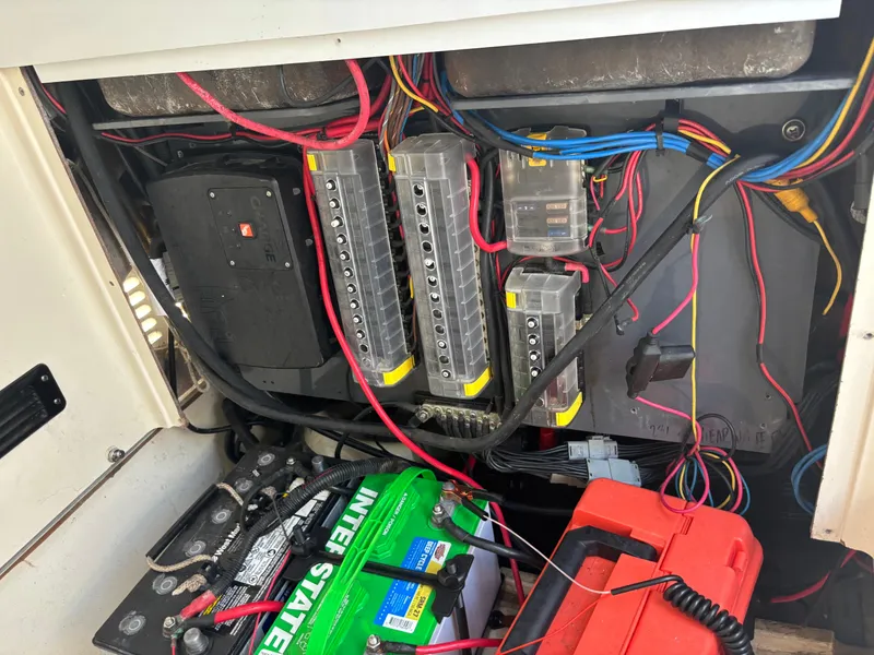 Slide: The Image of Electrical system of a 2016 ShearWater 260 Carolina Bay boat with wiring and battery. - 29