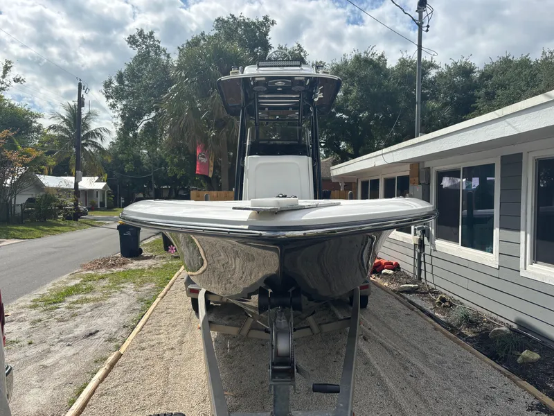 Slide: The Image of 2016 ShearWater 260 Carolina Bay boat on trailer, parked in residential area. - 3