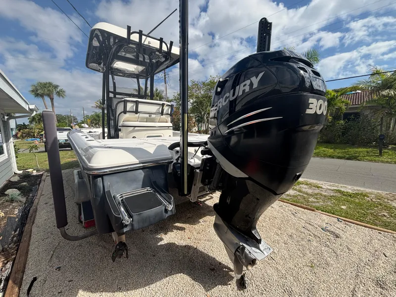 Slide: The Image of 2016 ShearWater 260 Carolina Bay boat with Mercury 300 engine, parked outdoors. - 7