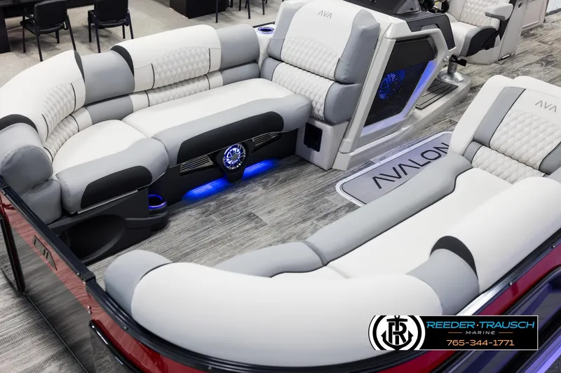 Slide: The Image of Luxurious 2025 Avalon Excalibur LTD CRB boat interior with plush seating and ambient lighting. - 10