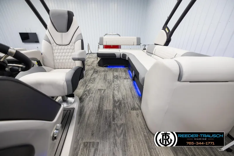 Slide: The Image of Luxurious interior of 2025 Avalon Excalibur LTD CRB boat with modern seating and ambient lighting. - 14