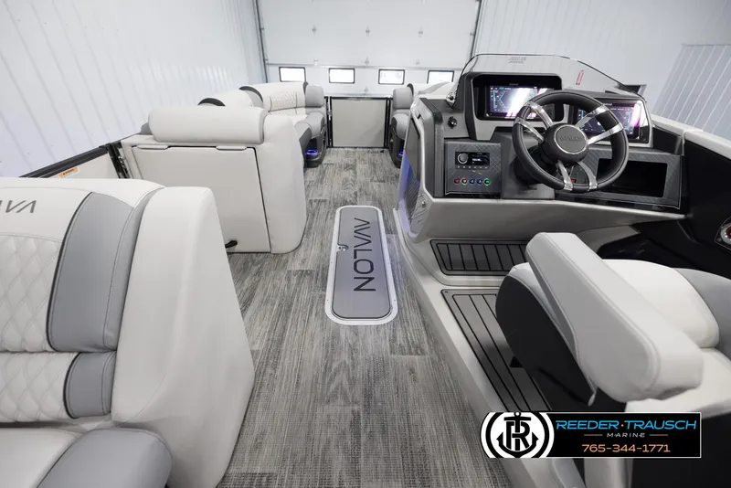 Slide: The Image of 2025 Avalon Excalibur LTD CRB interior with modern dashboard and luxurious seating. - 17