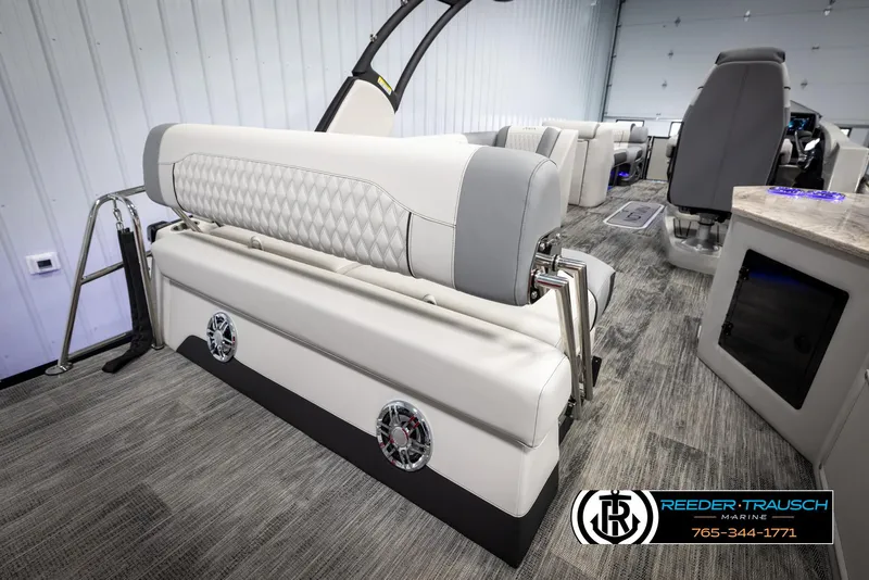 Slide: The Image of Luxurious interior of 2025 Avalon Excalibur LTD CRB boat with plush seating and modern design. - 24