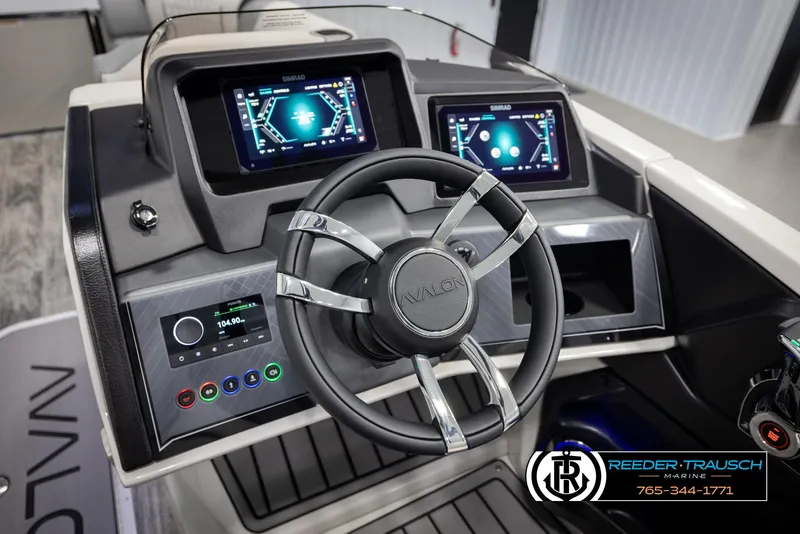 Slide: The Image of Steering console of 2025 Avalon Excalibur LTD CRB with digital displays and controls. - 31