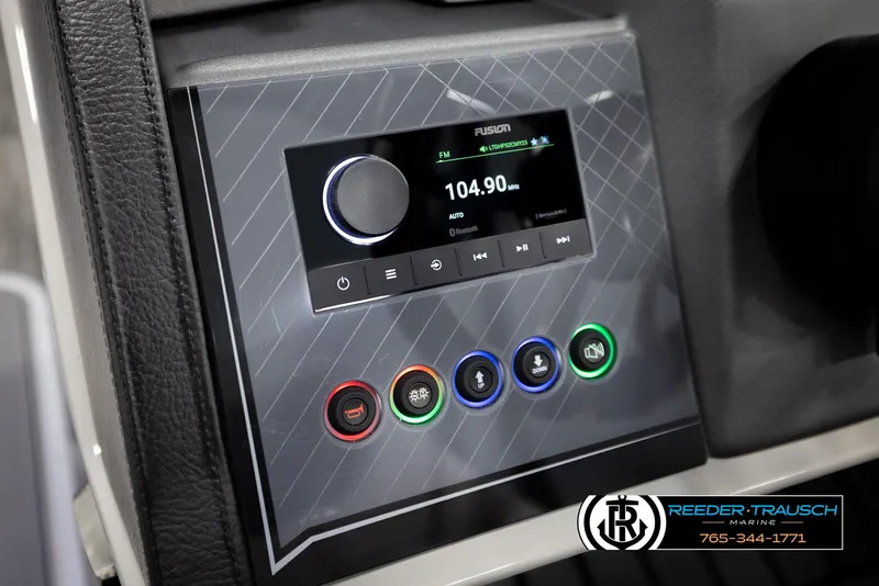 Slide: The Image of 2025 Avalon Excalibur LTD CRB dashboard with modern control panel and radio display. - 33