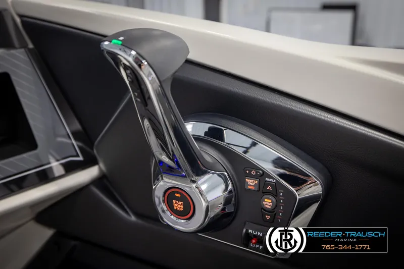 Slide: The Image of Interior view of 2025 Avalon Excalibur LTD CRB throttle control panel. - 37