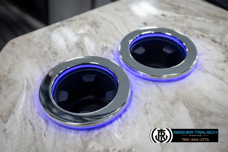 Slide: The Image of Illuminated cup holders on marble surface, Avalon Excalibur LTD CRB 2025. - 42