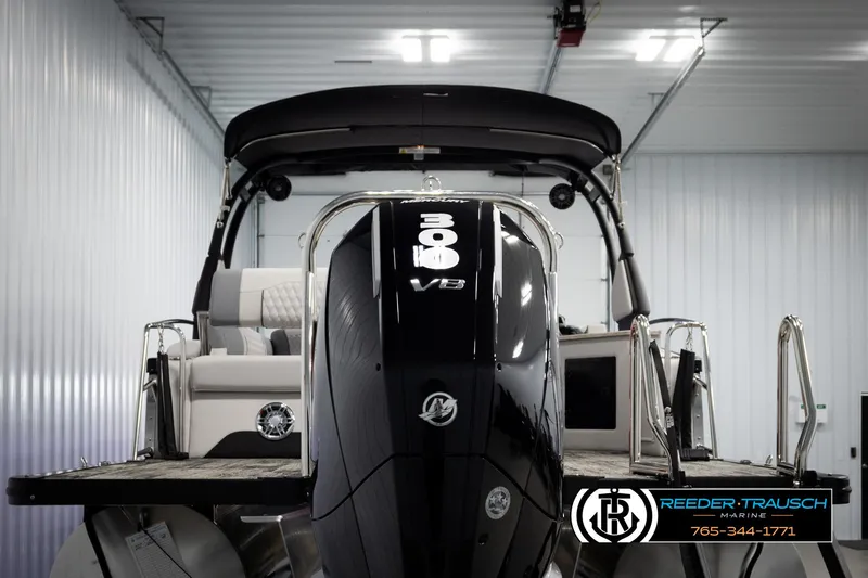 Slide: The Image of 2025 Avalon Excalibur LTD CRB boat with powerful 300 V8 engine in showroom. - 7