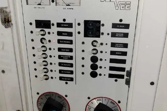Slide: The Image of Control panel of a 2002 SeaVee Center Console boat. - 5