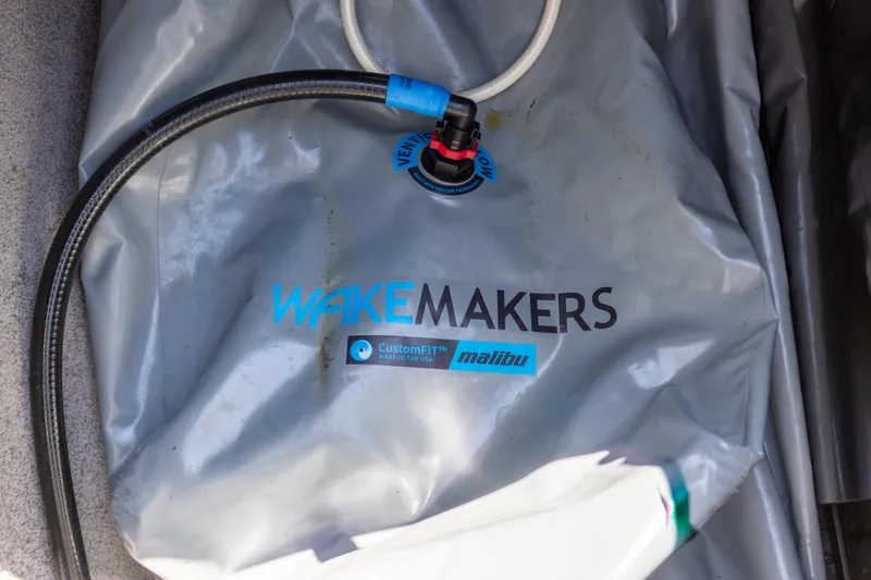 Slide: The Image of WakeMakers ballast bag in a 2016 Malibu 24.5 MKZ boat. - 32