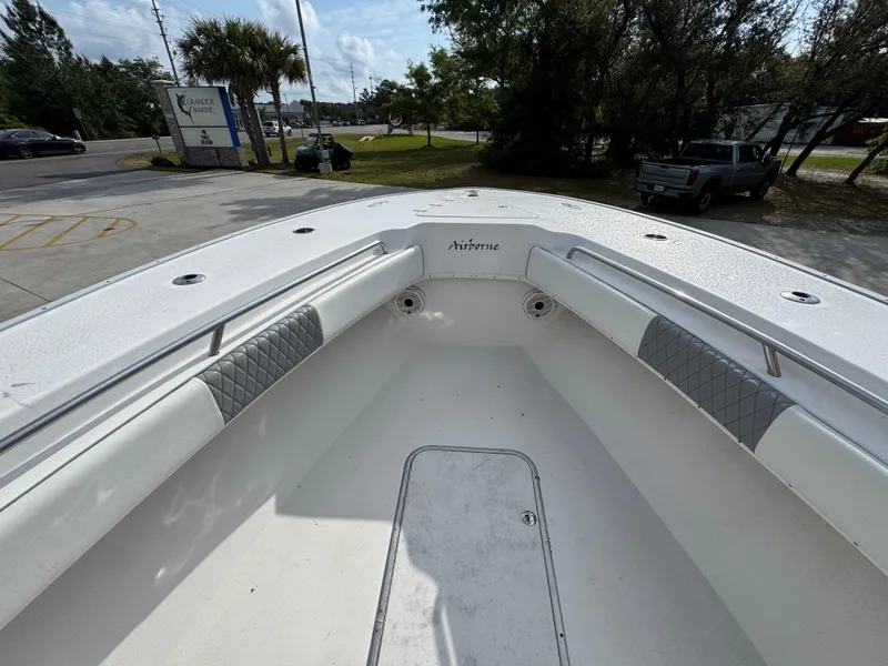 Slide: The Image of 2006 Cape Horn 31 T boat interior with cushioned seating and storage compartments. - 20
