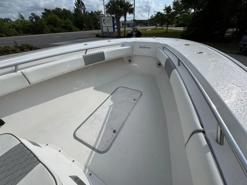 Slide: The Image of 2006 Cape Horn 31 T boat interior with seating and storage compartments. - 24