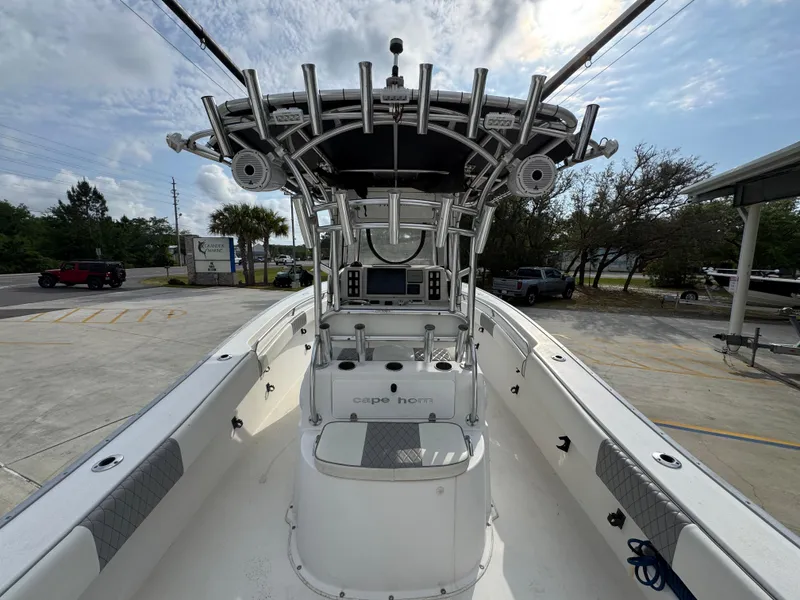 Slide: The Image of 2006 Cape Horn 31 T boat with center console and T-top in a parking area. - 32