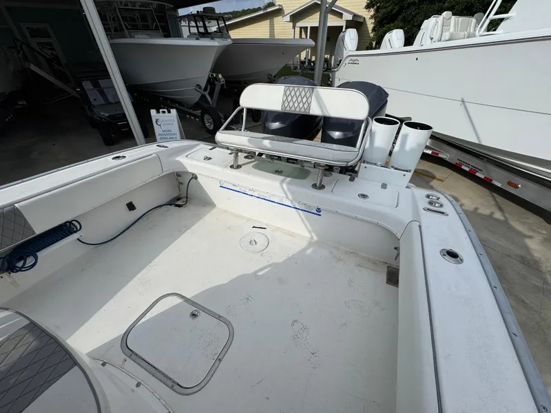 Slide: The Image of 2006 Cape Horn 31 T boat interior with seating and storage compartments. - 33