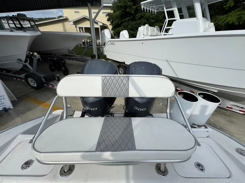 Slide: The Image of 2006 Cape Horn 31 T boat with dual engines and cushioned seating. - 35