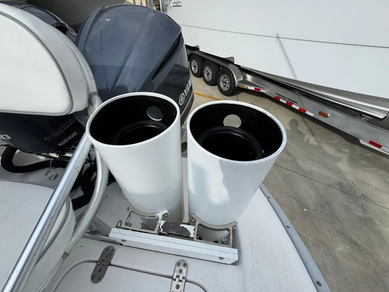 Slide: The Image of 2006 Cape Horn 31 T boat with dual outboard motors and rod holders. - 36